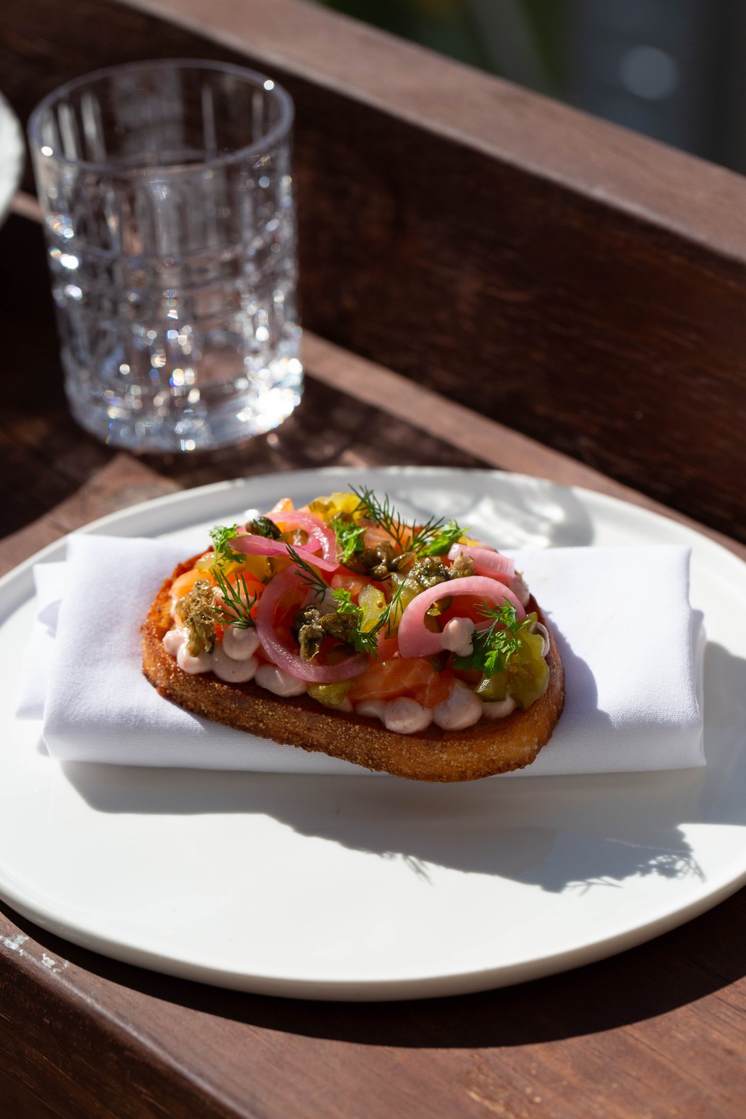 Tartare on toasted sourdough, plated in the afternoon sun