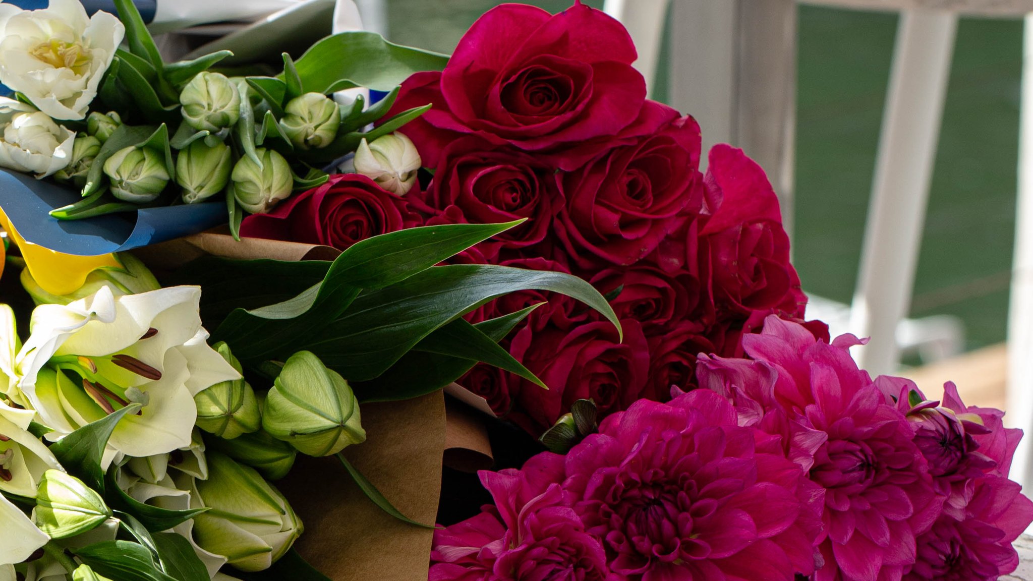 Roses, lilies and dahlias wrapped for the Sunday flower market